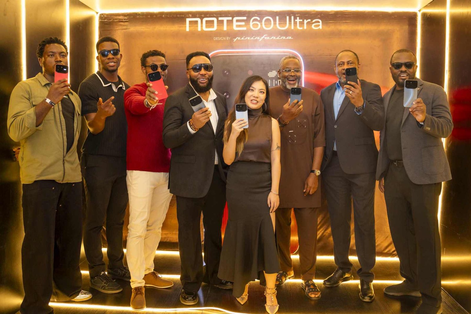 Crank, Head of Auto, 234 Drive; Izzie Boye, Tech Expert; Nnamdi Ezeigbo, CEO, SLOT Nigeria; Yefui Nui, Marketing Manager, Infinix Nigeria; Olusegun Adebayo, CEO Harmony Stores with others at the Infinix Note 60 Ultra launch event