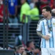 Argentina’s forward #10 Lionel Messi looks at the trophy after losing the 2026 World Cup football tournament final match between Spain and Argentina at the New York/New Jersey Stadium in East Rutherford on July 19, 2026. (Photo by PATRICIA DE MELO MOREIRA / AFP)